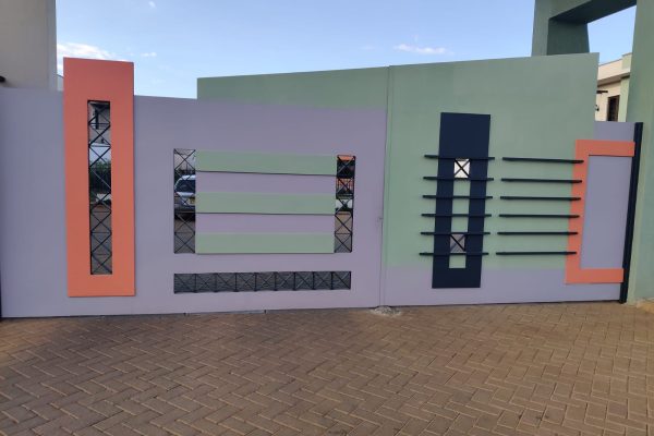 Main door steel gates with canopied roof